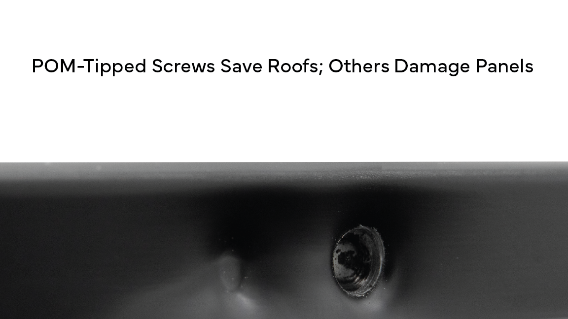 A bare steel set screw dimples and punctures a metal roof panel